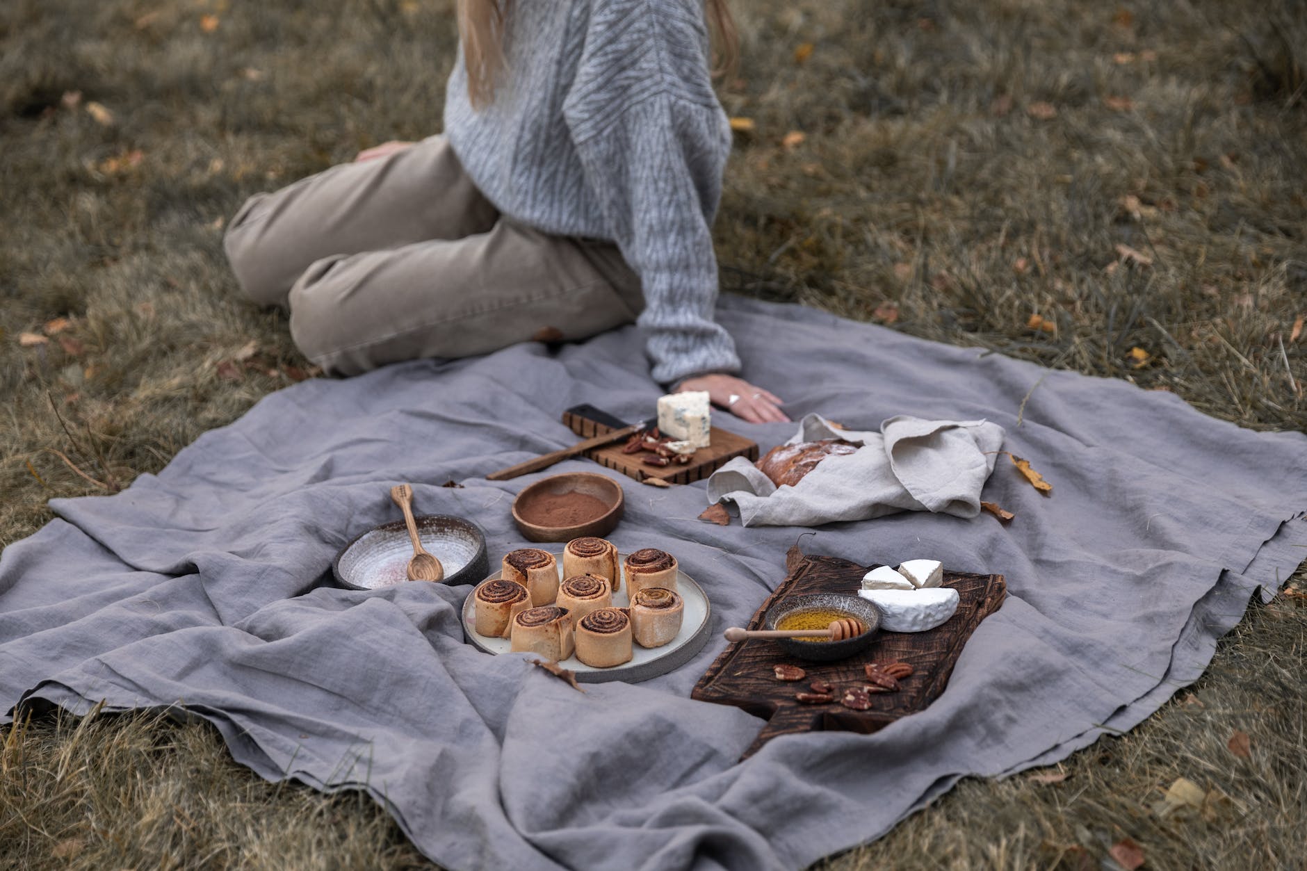 woman having picnic on autumn day